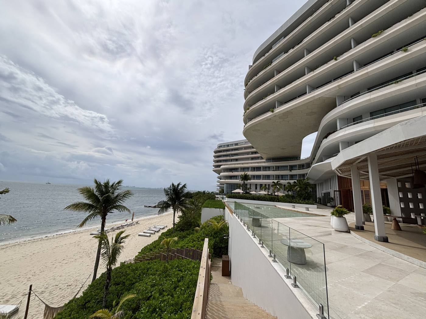 The quiet beach below the hotel